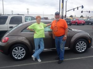 Jeri and Derrel with their custom 2013 VW Beetle TDi 